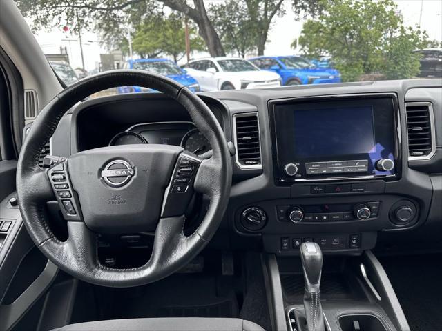 Photo of 2024 Glacier White Nissan Frontier