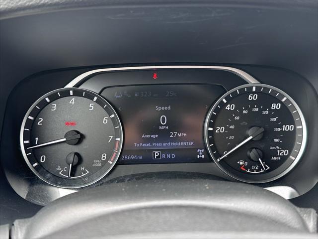 Photo of 2024 Glacier White Nissan Frontier