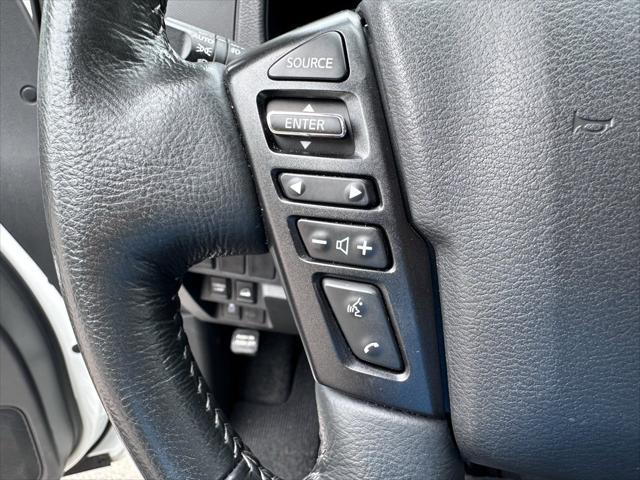 Photo of 2024 Glacier White Nissan Frontier