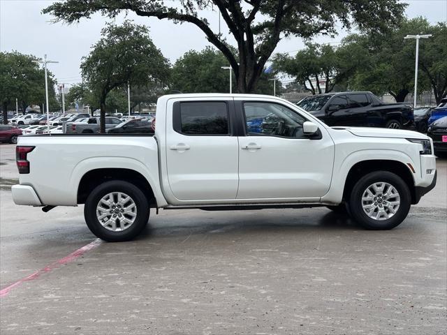 Photo of 2024 Glacier White Nissan Frontier