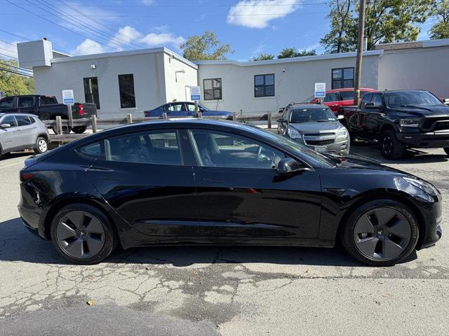 Photo of 2022 Solid Black Tesla Model 3