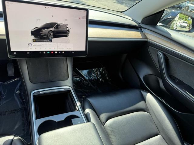 Photo of 2022 Solid Black Tesla Model 3