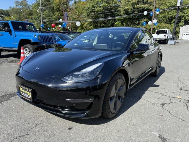 Photo of 2022 Solid Black Tesla Model 3