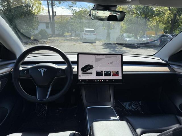 Photo of 2022 Solid Black Tesla Model 3