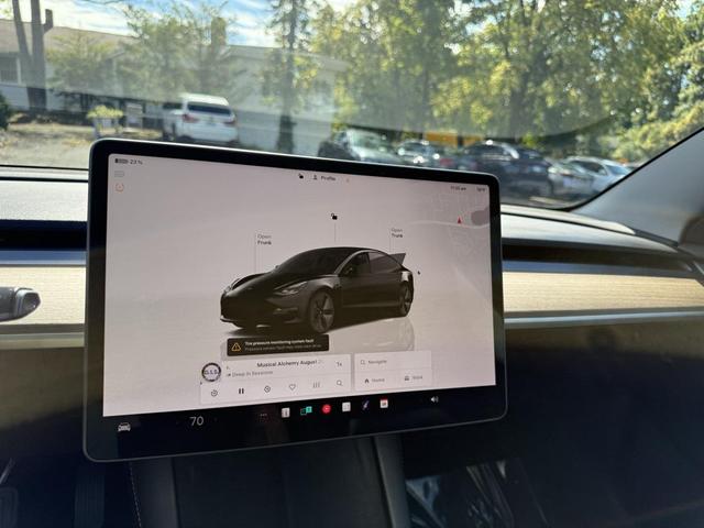 Photo of 2022 Solid Black Tesla Model 3