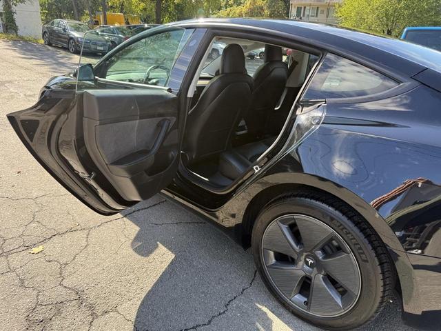 Photo of 2022 Solid Black Tesla Model 3
