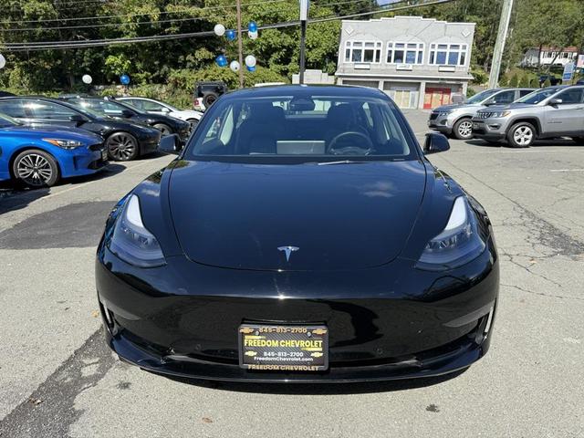 Photo of 2022 Solid Black Tesla Model 3