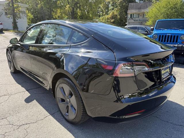 Photo of 2022 Solid Black Tesla Model 3