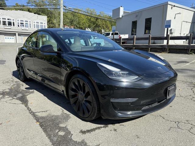 Photo of 2021 Solid Black Tesla Model 3