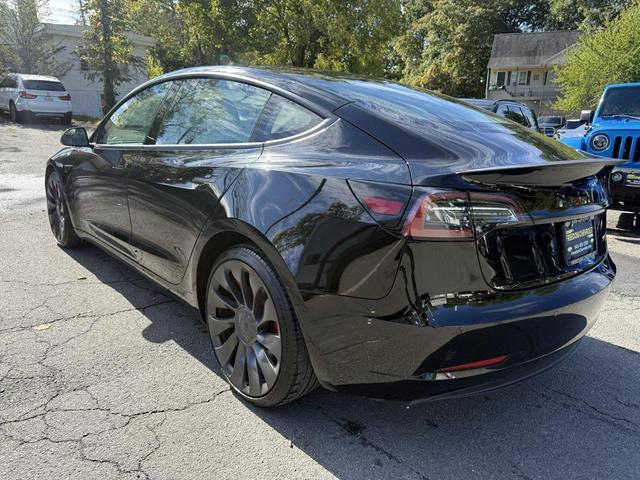 Photo of 2021 Solid Black Tesla Model 3