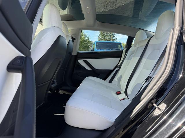 Photo of 2021 Solid Black Tesla Model 3