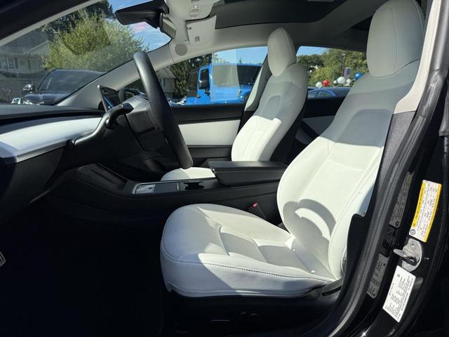 Photo of 2021 Solid Black Tesla Model 3