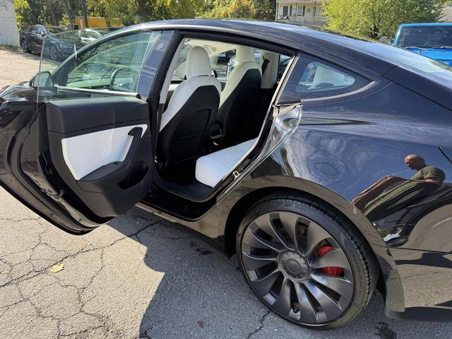 Photo of 2021 Solid Black Tesla Model 3