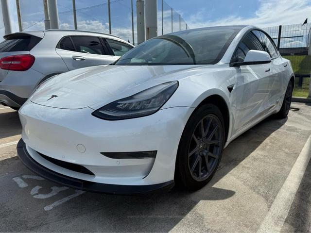 Photo of 2020 Pearl White Multi Tesla Model 3