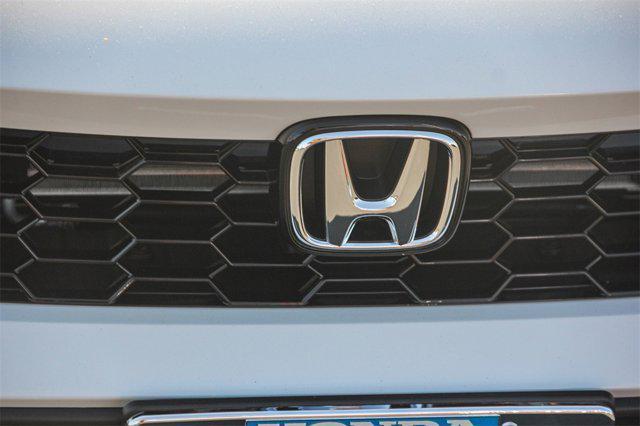 Photo of 2026 Platinum White Pearl Honda Civic Hybrid