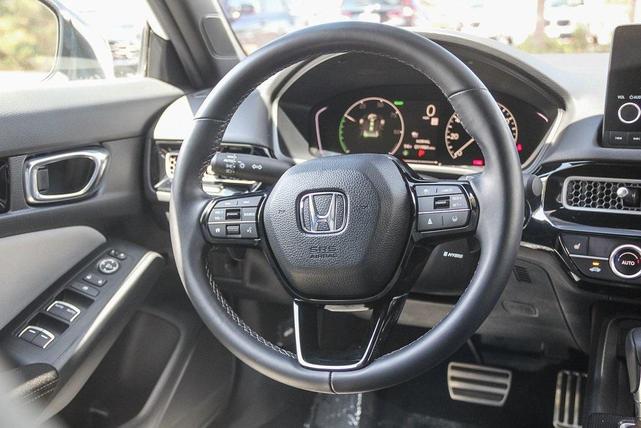 Photo of 2025 Platinum White Pearl Honda Civic Hybrid