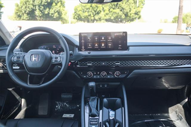 Photo of 2025 Meteorite Gray Metallic Honda Accord Hybrid