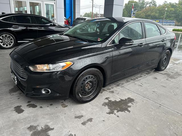 Photo of 2015 Tuxedo Black Ford Fusion