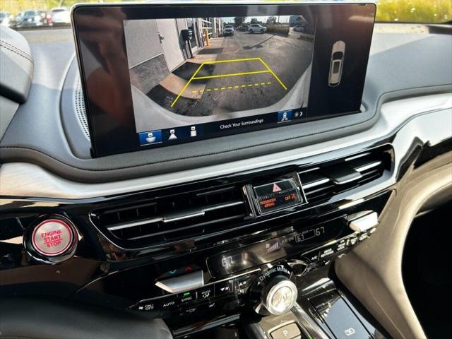 Photo of 2025 White Pearl Acura MDX