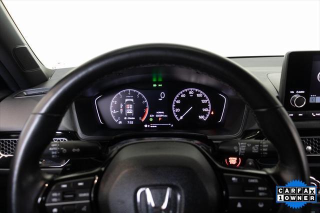 Photo of 2024 Boost Blue Pearl Honda Civic