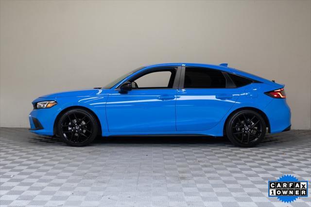 Photo of 2024 Boost Blue Pearl Honda Civic