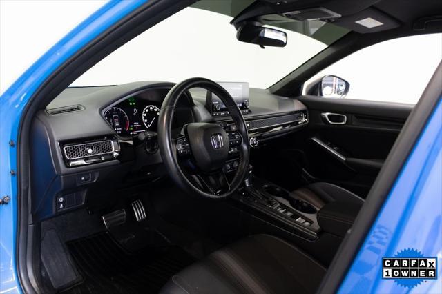 Photo of 2024 Boost Blue Pearl Honda Civic