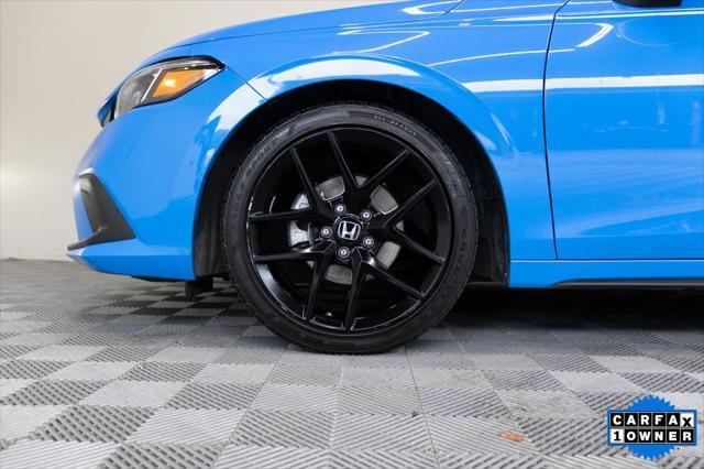 Photo of 2024 Boost Blue Pearl Honda Civic