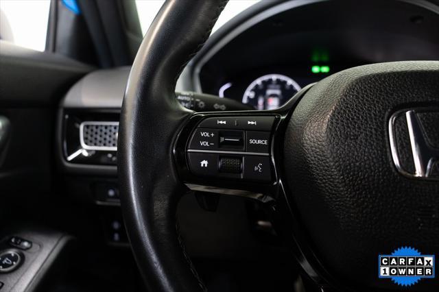 Photo of 2024 Boost Blue Pearl Honda Civic
