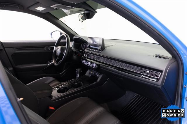 Photo of 2024 Boost Blue Pearl Honda Civic