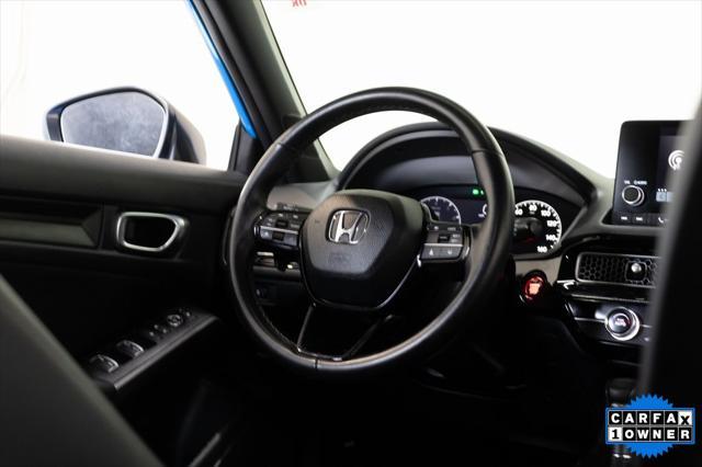Photo of 2024 Boost Blue Pearl Honda Civic