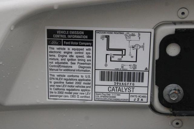 Photo of 2002 Whisper White Ford Thunderbird