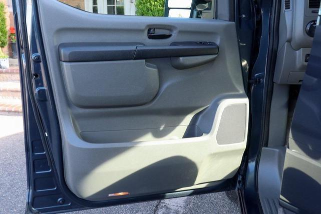 Photo of 2018 Arctic Blue Metallic Nissan NV Passenger NV3500 HD