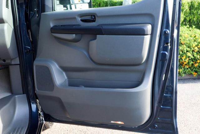 Photo of 2018 Arctic Blue Metallic Nissan NV Passenger NV3500 HD