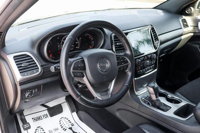 Photo of 2021 Bright White Clearcoat Jeep Grand Cherokee