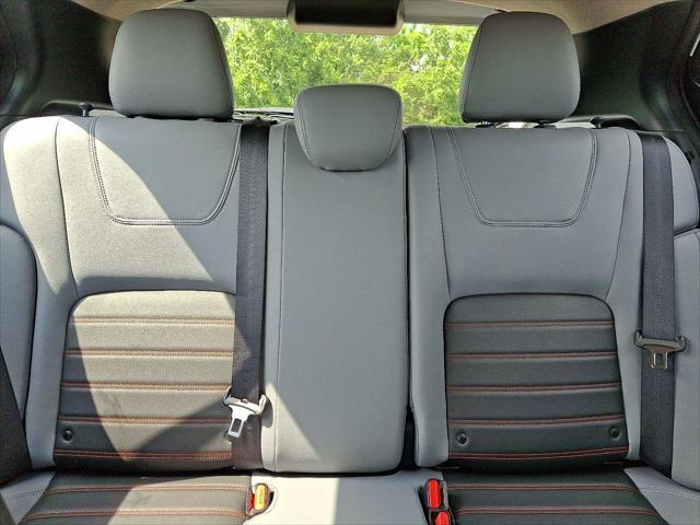 Photo of 2024 Aspen White Tricoat Nissan Kicks