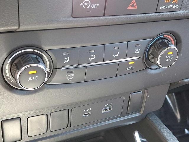 Photo of 2024 Glacier White Nissan Frontier