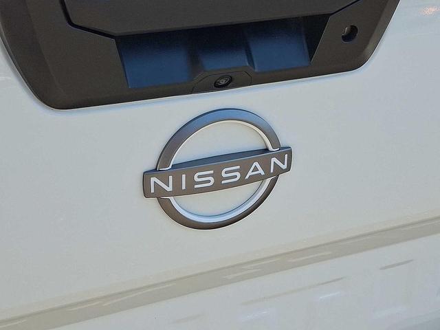 Photo of 2024 Glacier White Nissan Frontier