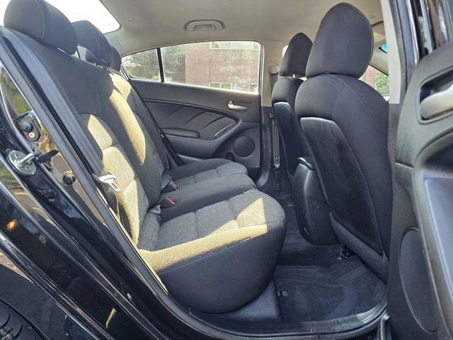 Photo of 2017 Aurora Black Kia Forte