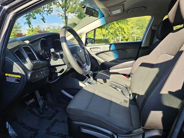 Photo of 2017 Aurora Black Kia Forte