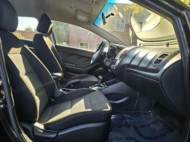 Photo of 2017 Aurora Black Kia Forte