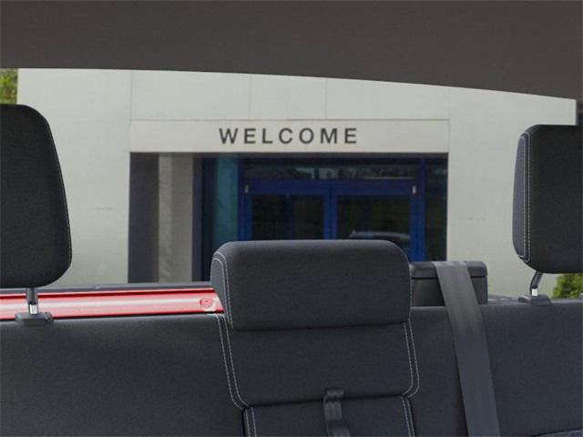 Photo of 2025 Ruby Red Metallic Tinted Clearcoat Ford Ranger