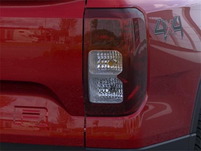 Photo of 2025 Ruby Red Metallic Tinted Clearcoat Ford Ranger