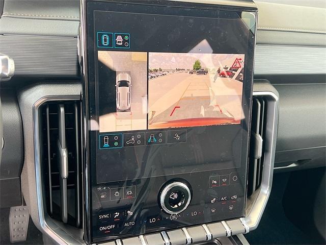 Photo of 2026 Volcanic Red GMC Acadia