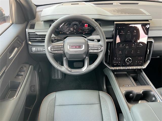Photo of 2026 Volcanic Red GMC Acadia
