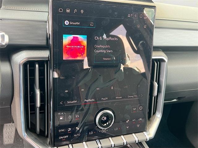 Photo of 2026 Volcanic Red GMC Acadia