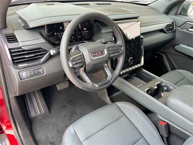 Photo of 2026 Volcanic Red GMC Acadia
