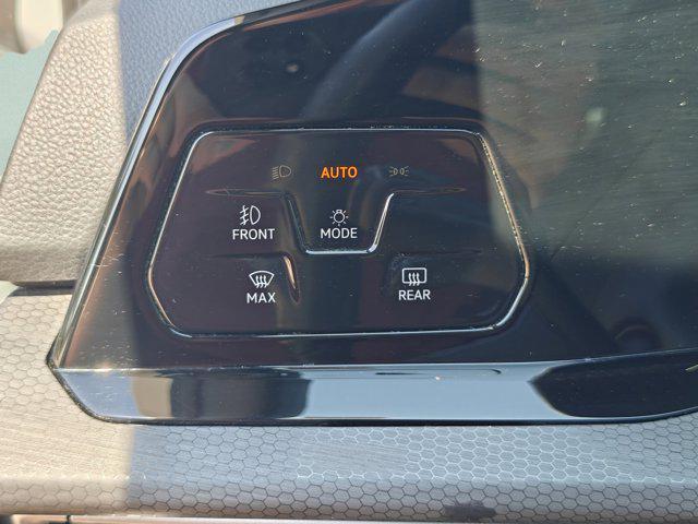 Photo of 2024 Opal White Volkswagen Golf GTI