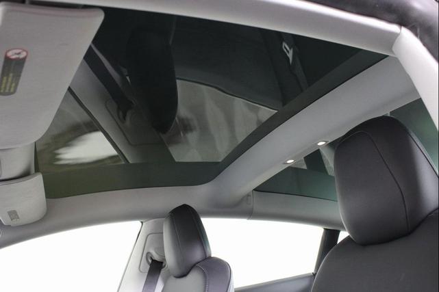 Photo of 2021 Pearl White Multi-Coat Tesla Model 3