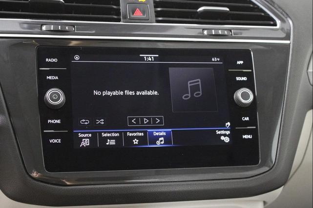 Photo of 2023 Atlantic Blue Metallic Volkswagen Tiguan