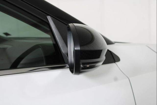 Photo of 2023 Aspen White Tricoat/Super Black Nissan Sentra